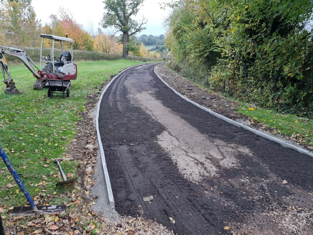 This is a large driveway which is in the process of having a tar and chip driveway installed on by Sittingbourne Driveways