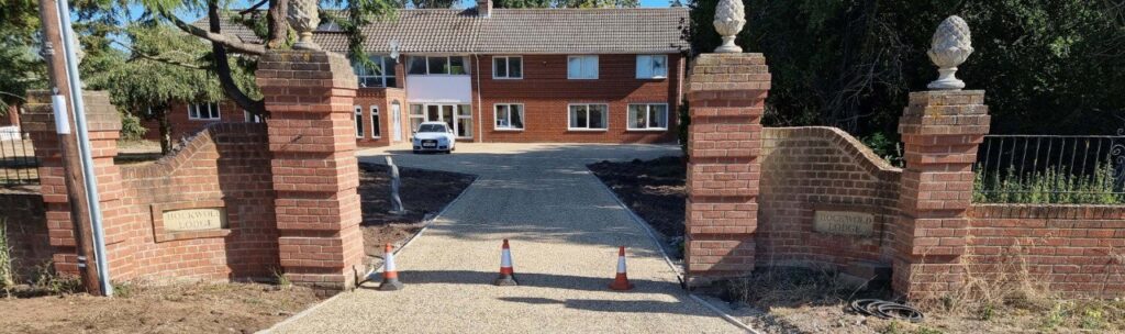 This is a photo of a newly installed chip and tar driveway, installed by Sittingbourne Driveways